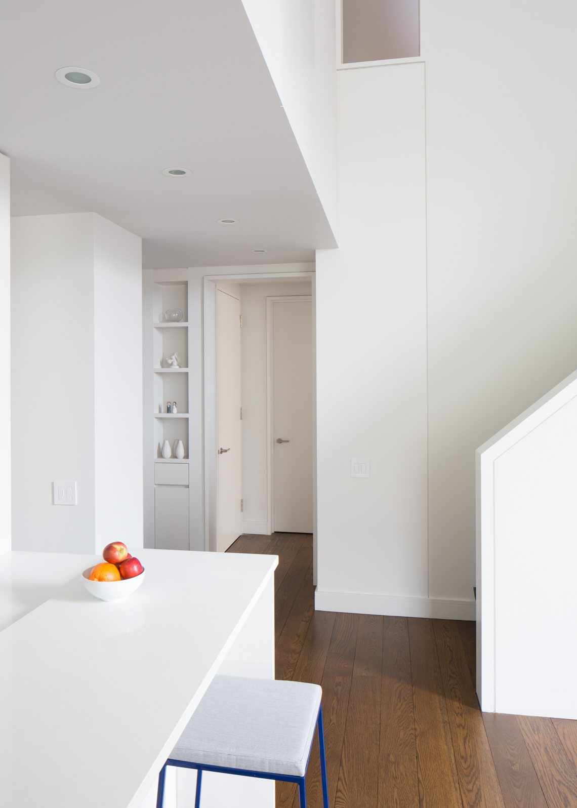Sleek white modern kitchen by Wettling Caogold