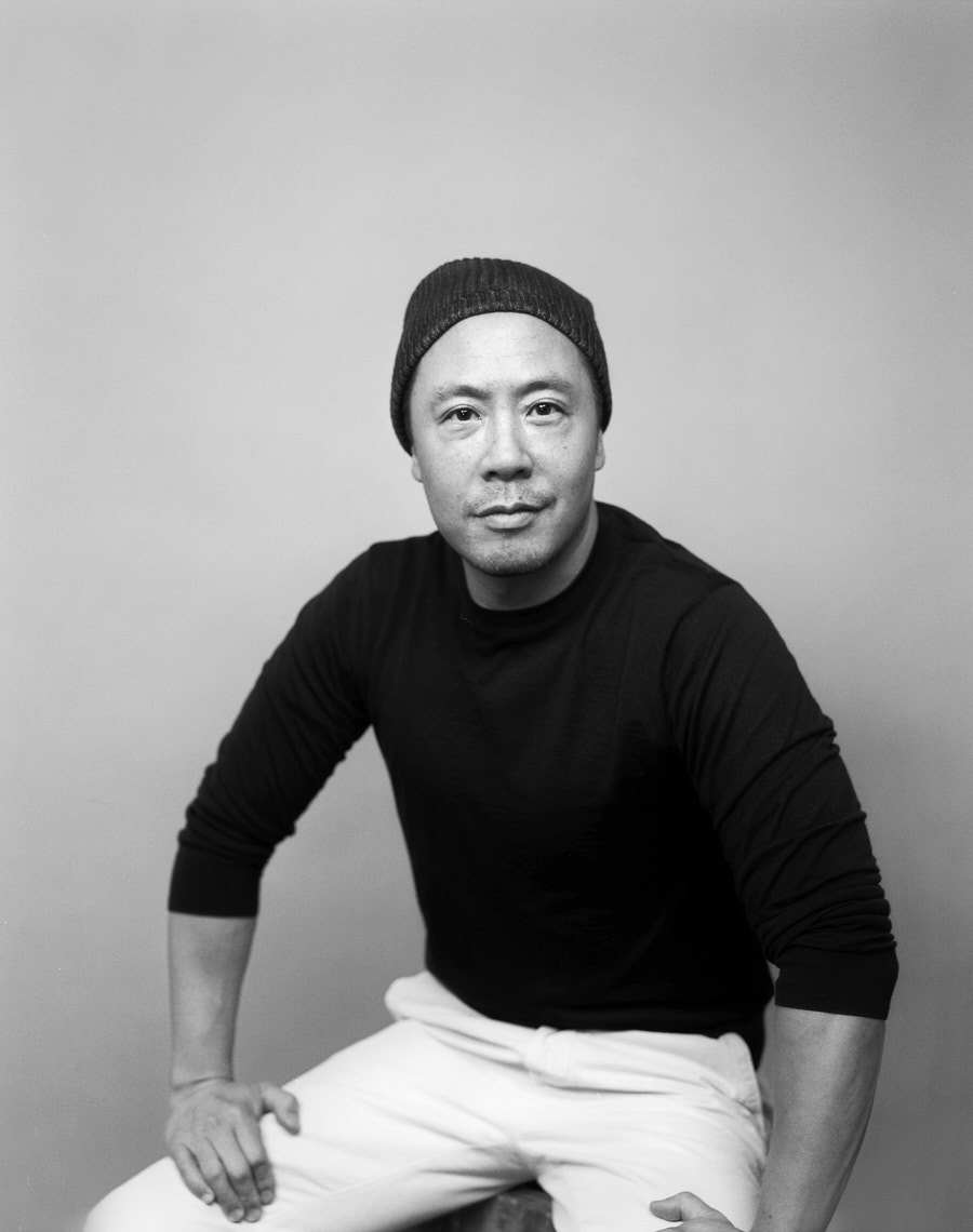 Black and white headshot of man