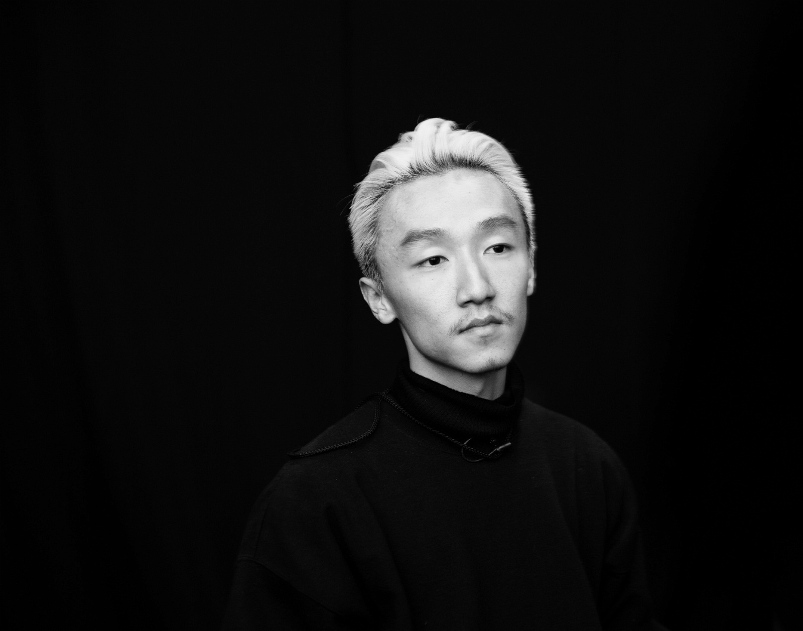 Menswear clothing designer Ximon Lee black and white portrait