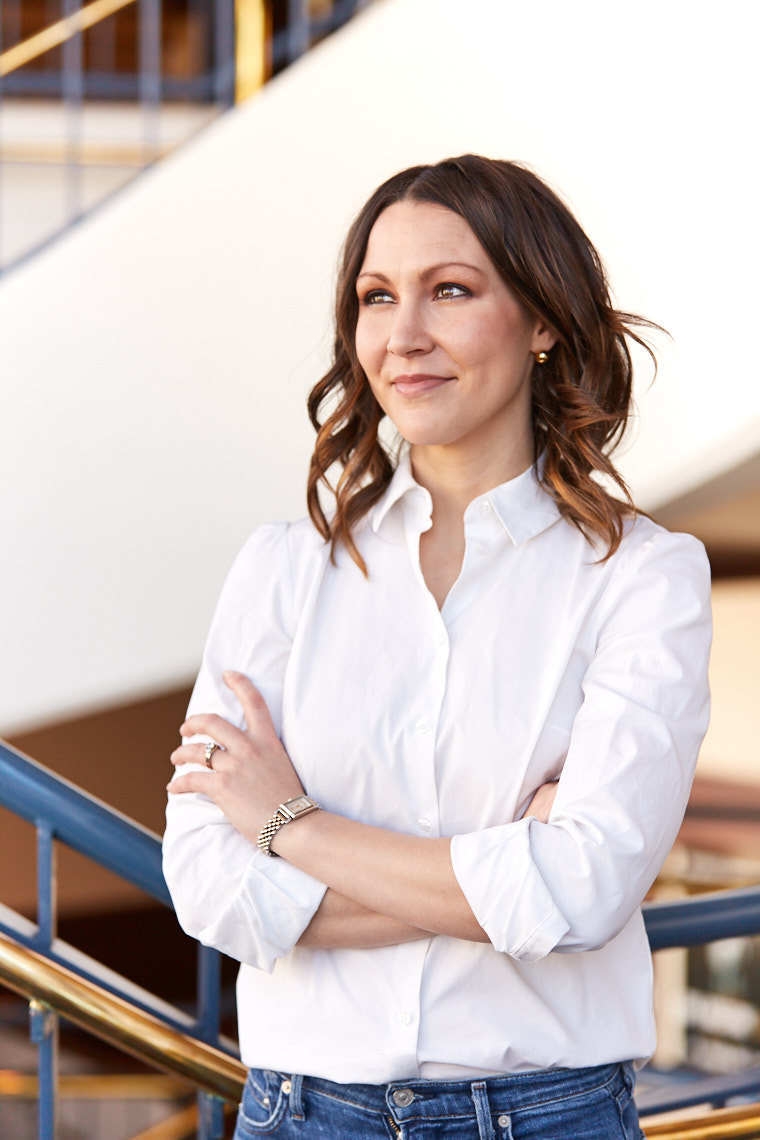 Portrait of Aubrey Bergauer in white blouse as executive director of the California Symphony